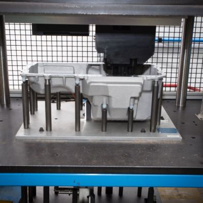 Semi-automated leak testing cell